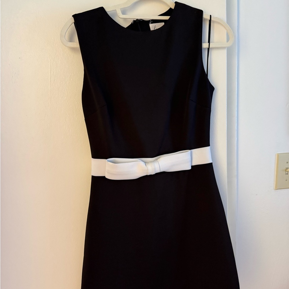 Elegant Black Dress with White Bow